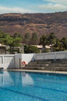 Guests taking a swim break in clear blue waters with the Toros mountains in the background.