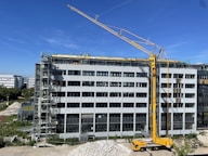 A modern construction site showcasing skilled workers in action.