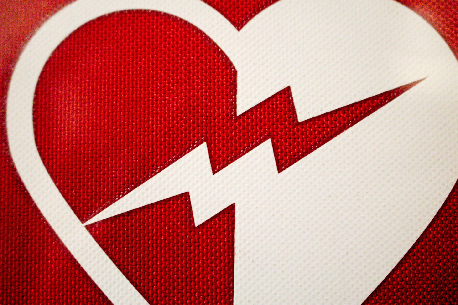 woman wearing yellow long-sleeved dress under white clouds and blue sky during daytime