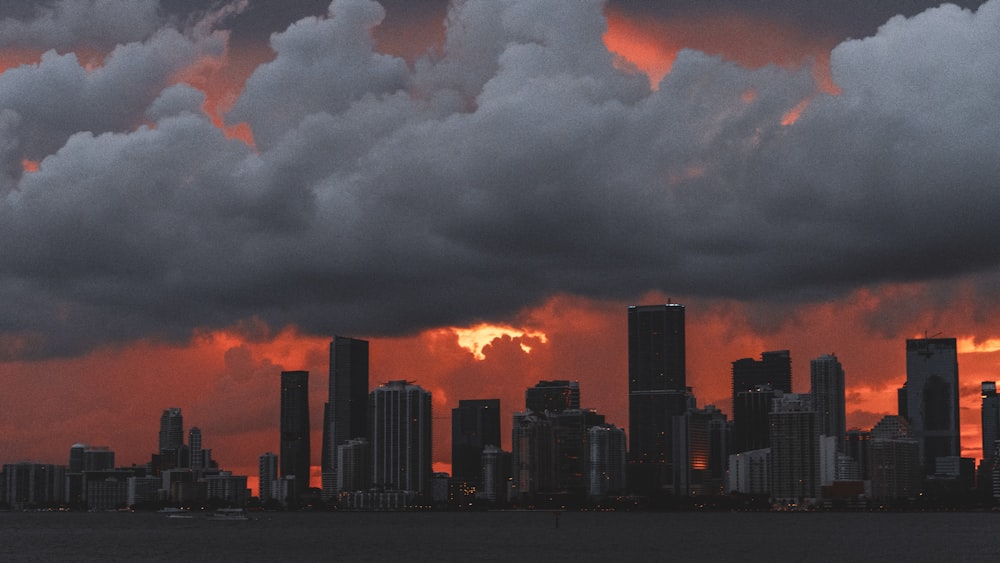 a large city with a lot of tall buildings under a cloudy sky