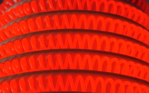 Close-up of thermal energy storage modules glowing with heat gradients.
