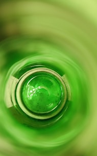 A beautifully crafted drinking glass made from a recycled bottle, showcasing its unique design.