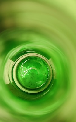 A beautifully crafted drinking glass made from a recycled bottle, showcasing its unique design.