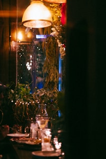 Warm ambient lighting highlighting the cozy interior filled with happy diners