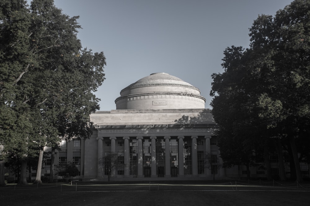 a black and white photo of a building with a dome