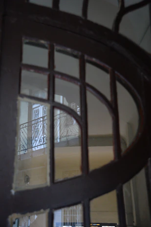 Close-up of a sleek steel gate with sharp, clean lines reflecting industrial craftsmanship.