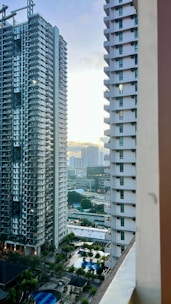 Luxury high-rise apartment with panoramic city views at sunset