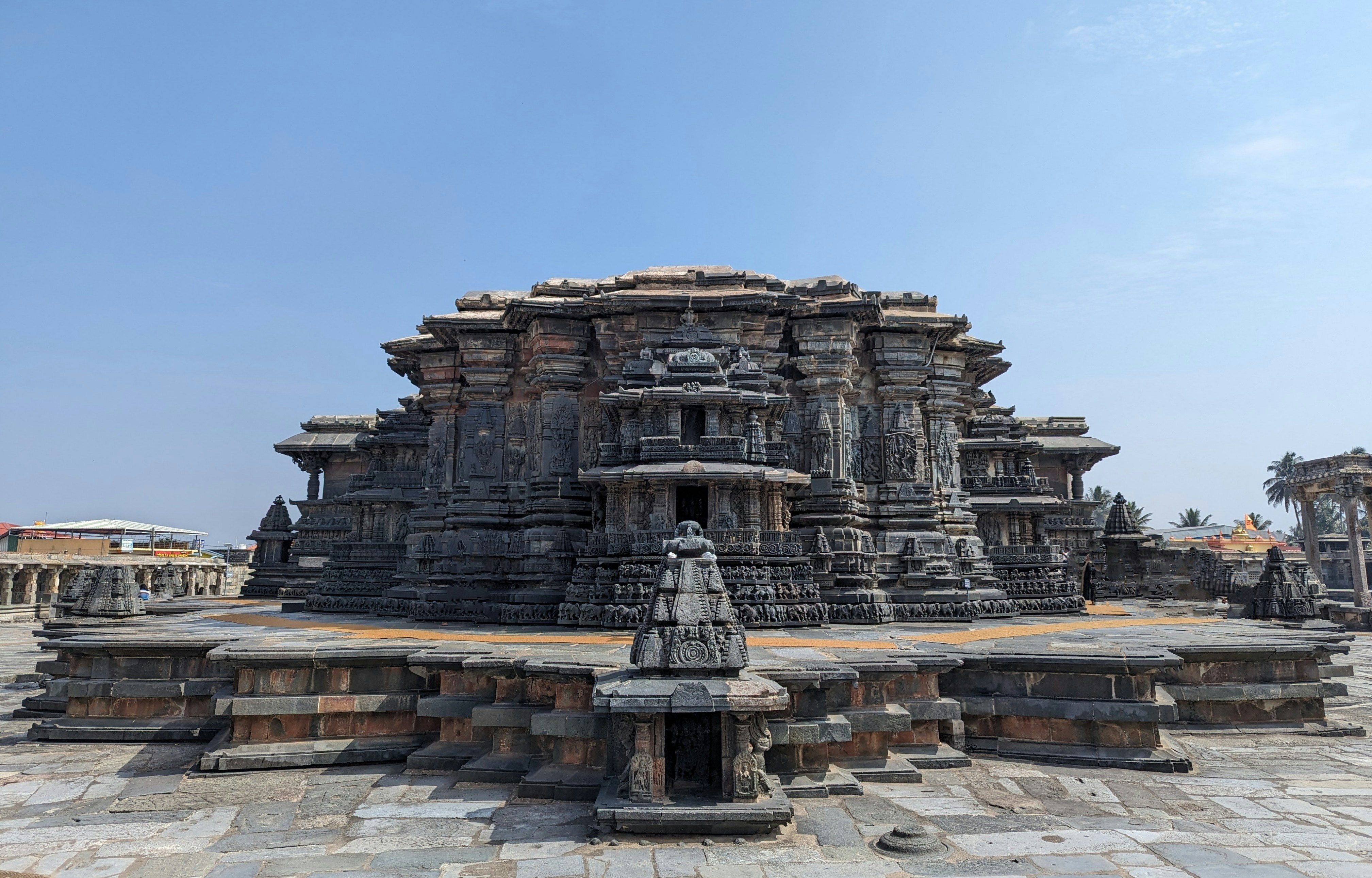a stone structure with a statue on top of it
