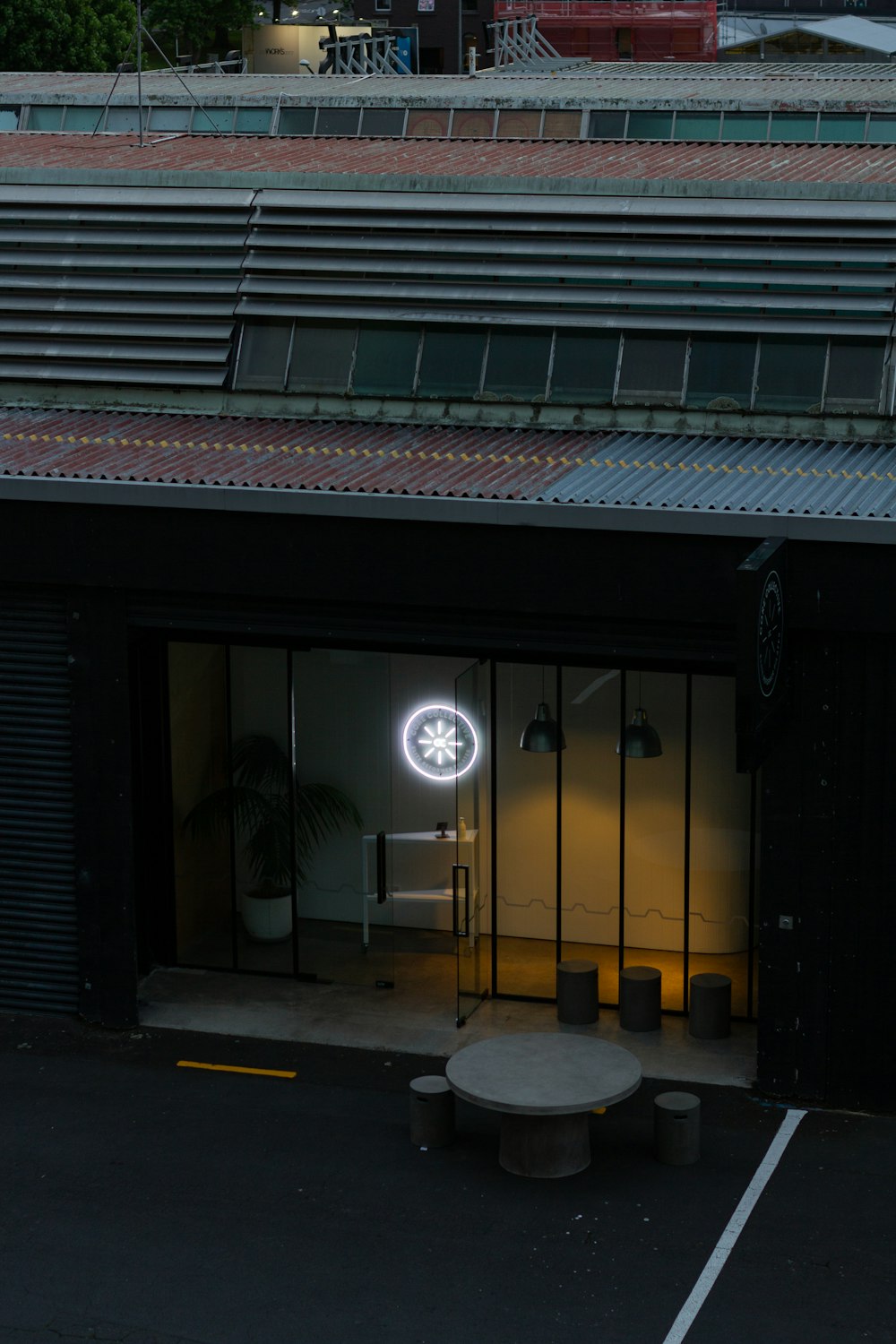 a black building with a white light on it