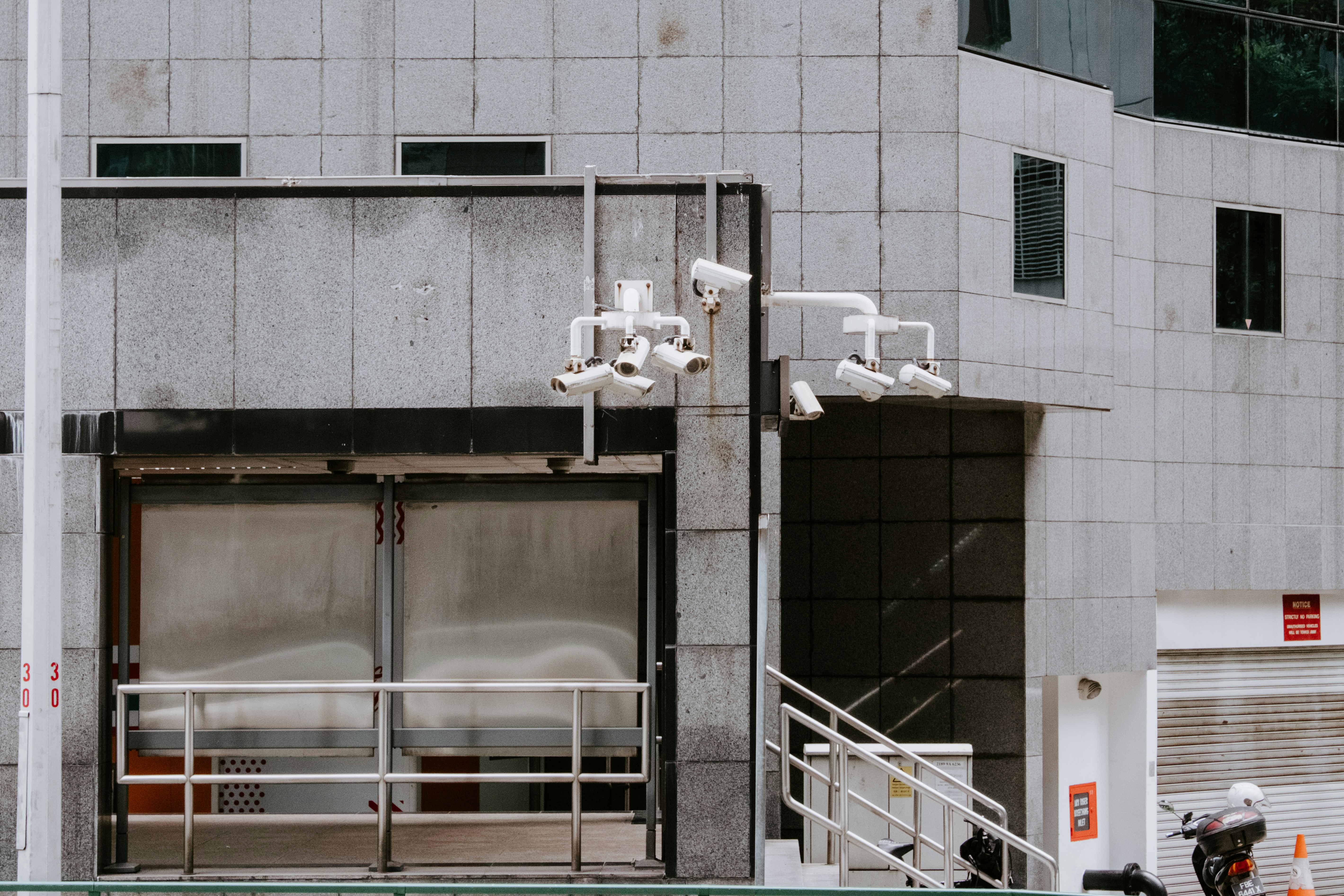 a building with a bunch of cameras on the outside of it
