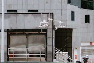 a building with a bunch of cameras on the outside of it