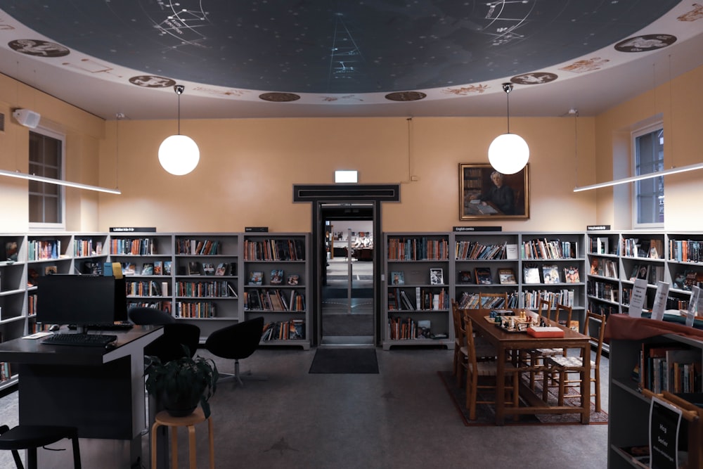 a library with a lot of books on the shelves