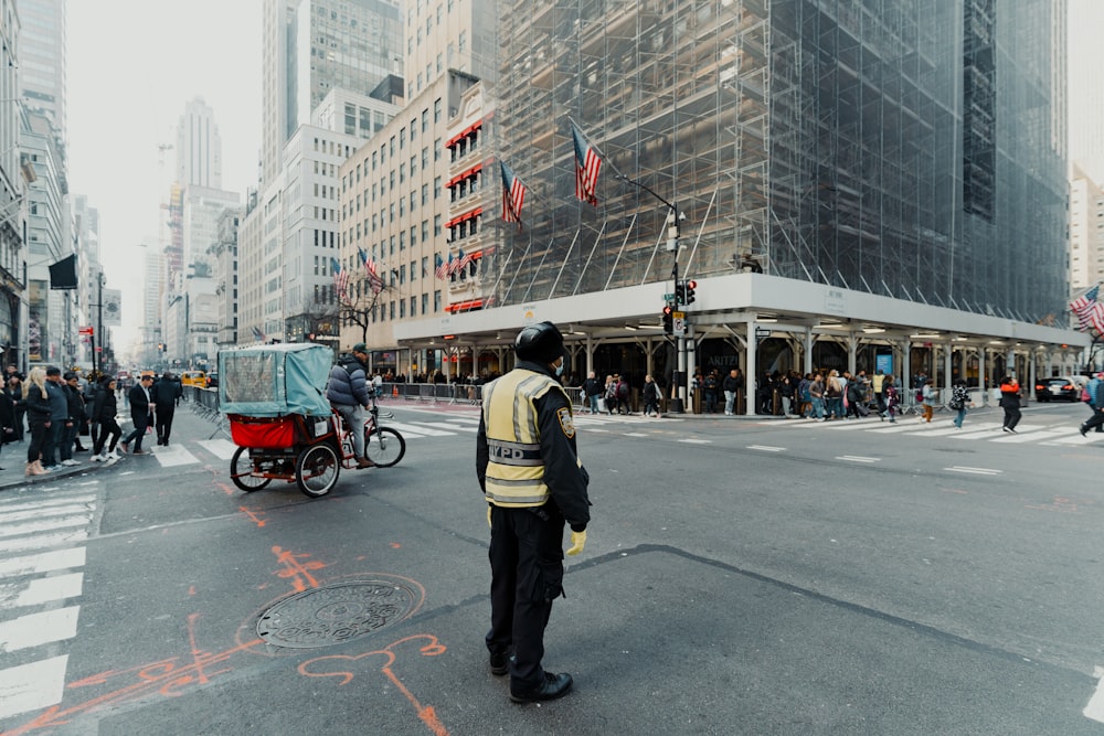 a man standing in the middle of a street