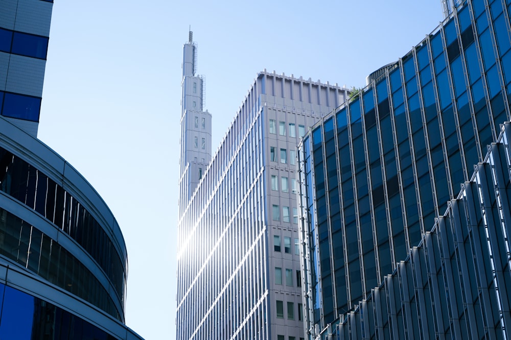 a group of tall buildings next to each other