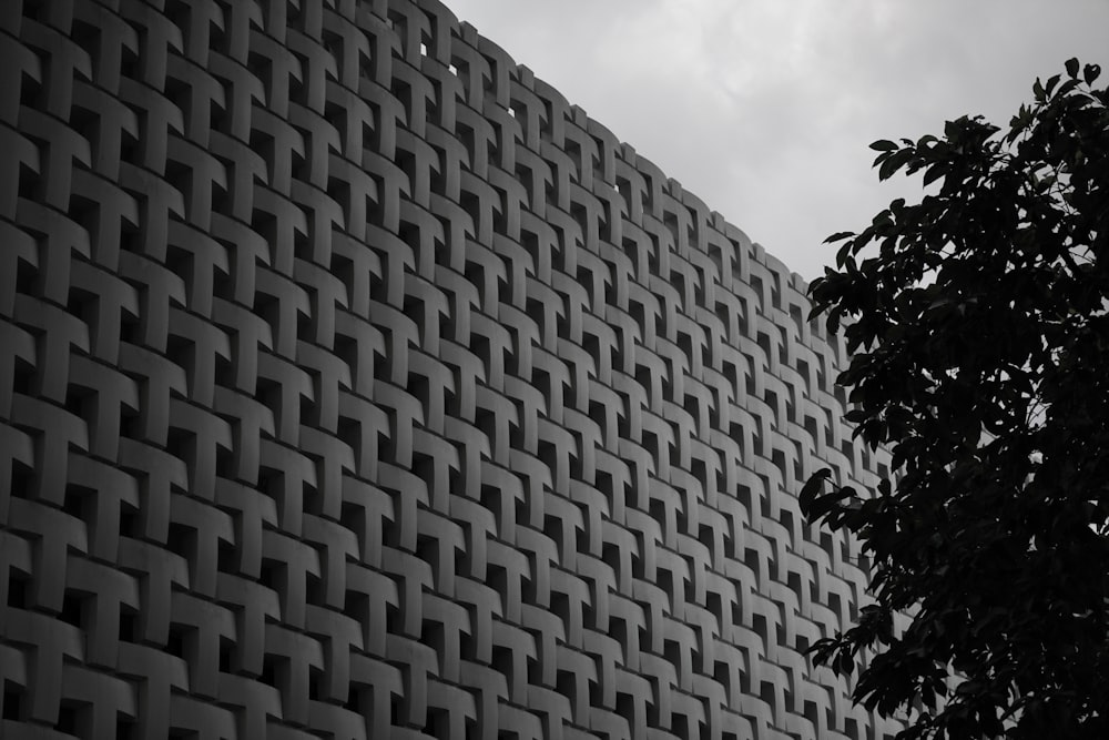 a black and white photo of a building made of bricks