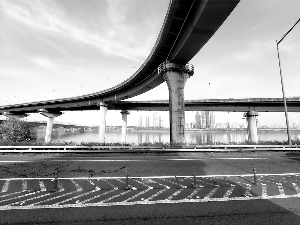 a black and white photo of a bridge