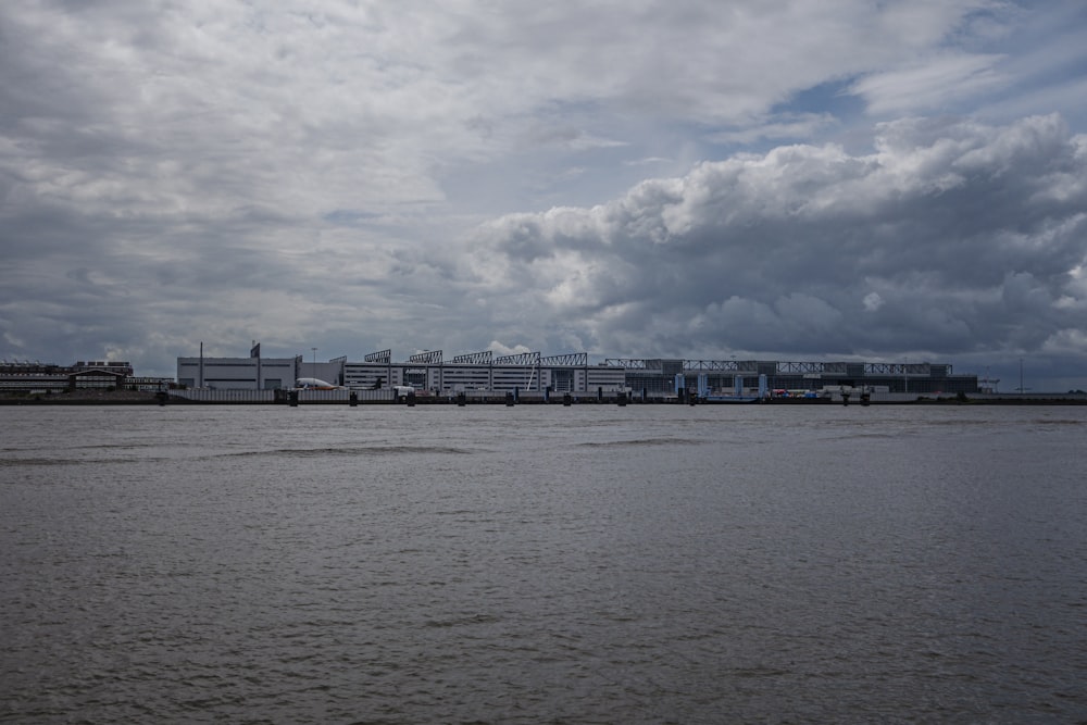 a body of water with a large ship in the distance