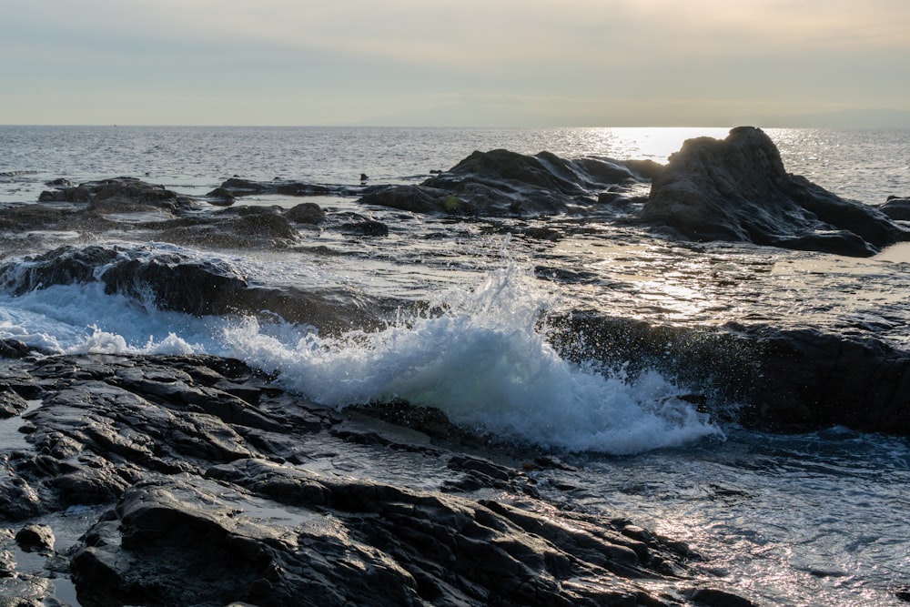 a large body of water surrounded by rocks