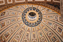 the dome of a building with paintings on it