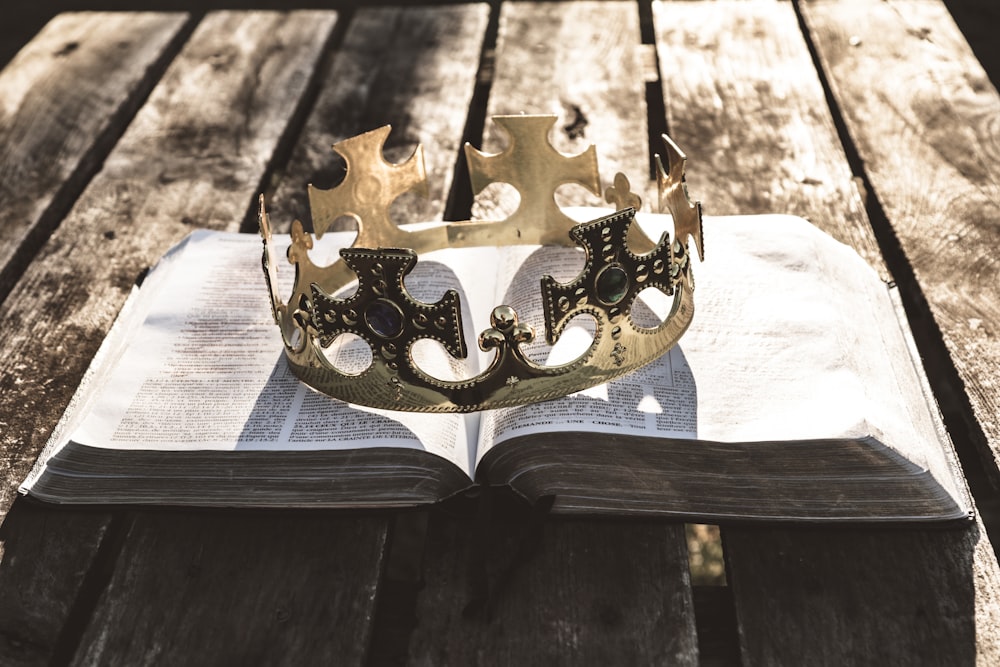 a book with a crown on top of it