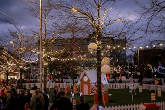 A festive outdoor scene adorned with holiday decorations and twinkling lights.