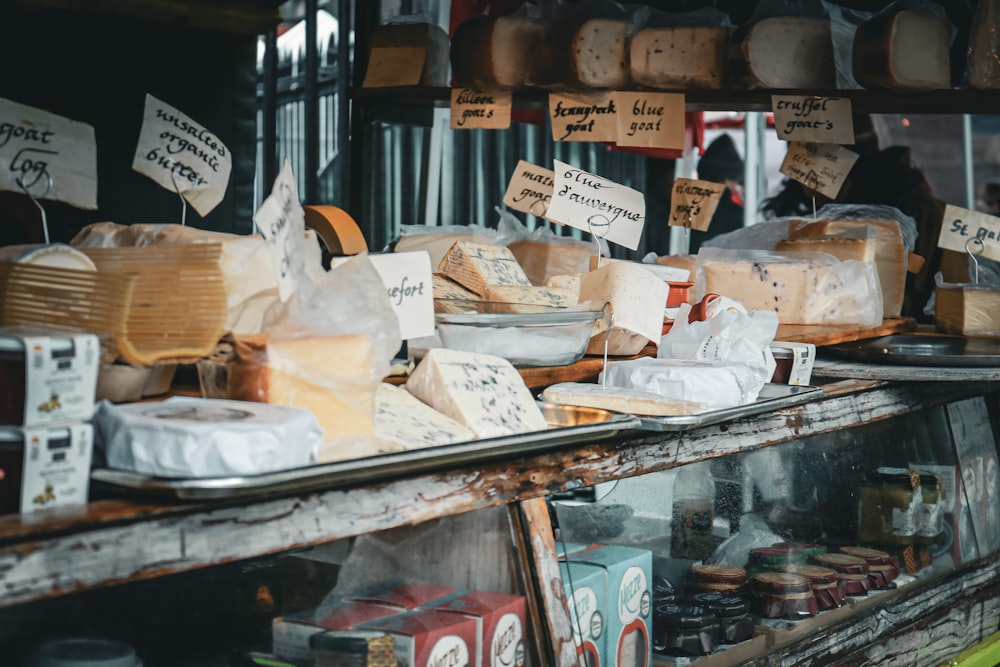 a bunch of cheeses that are on a table