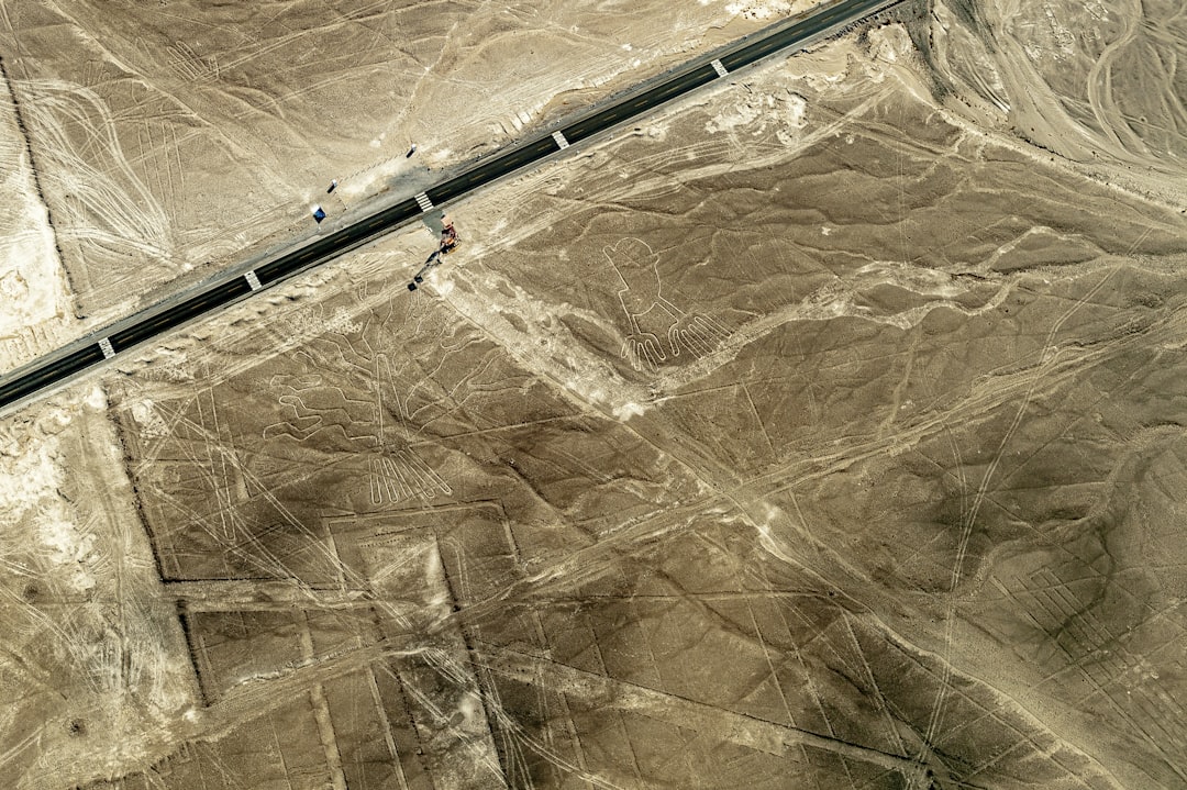 an aerial view of a highway in the desert, Nazca Lines