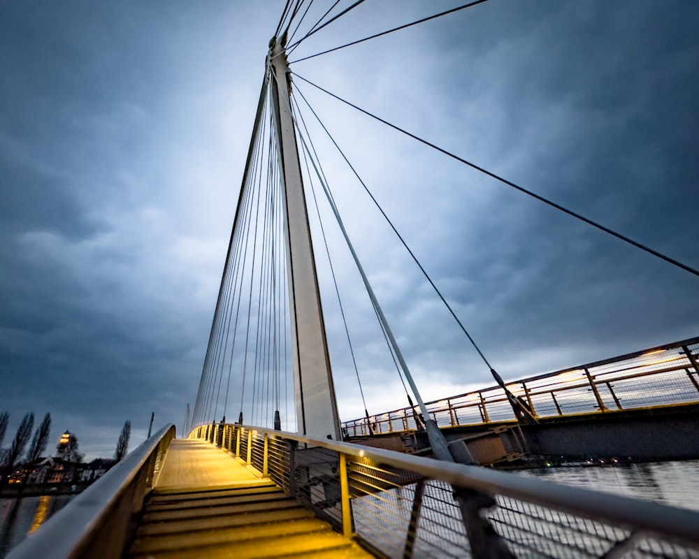 a view of the top of a bridge from the bottom of the stairs