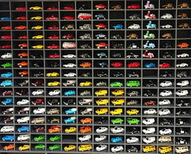 Display of various automotive parts neatly arranged on shelves.