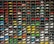 A display of various automobile spare parts neatly organized on shelves.