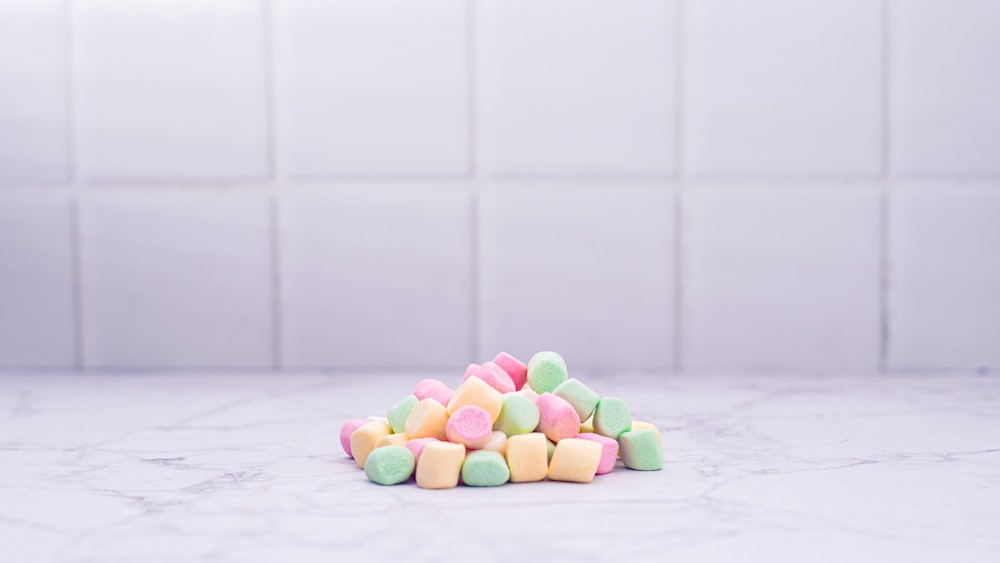 a pile of marshmallows sitting on top of a white counter