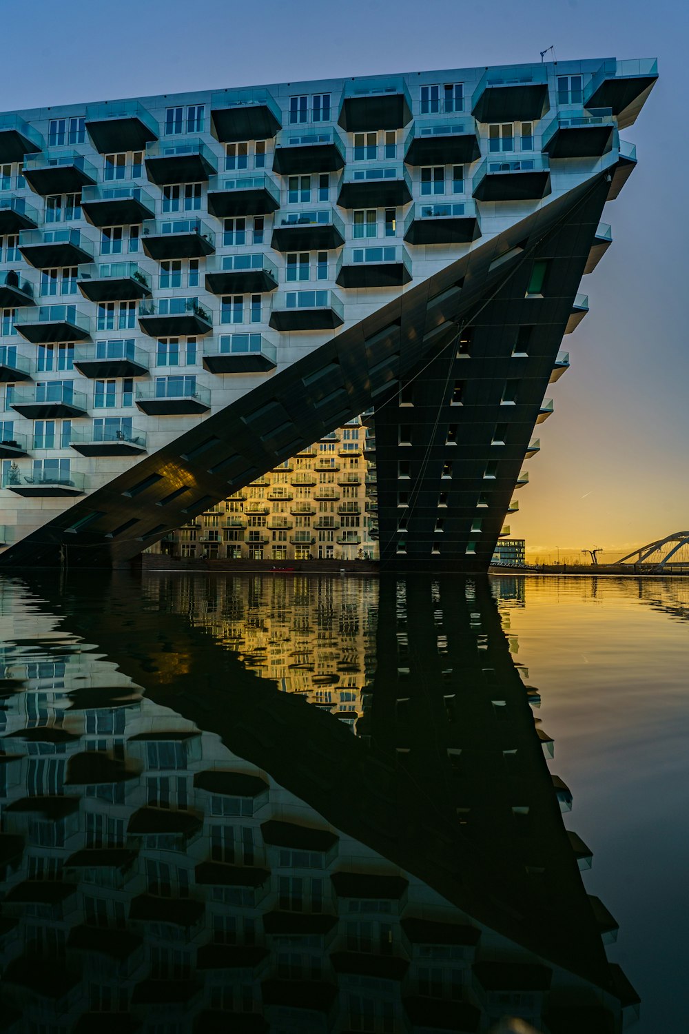 a very large building with a very tall triangle on it's side