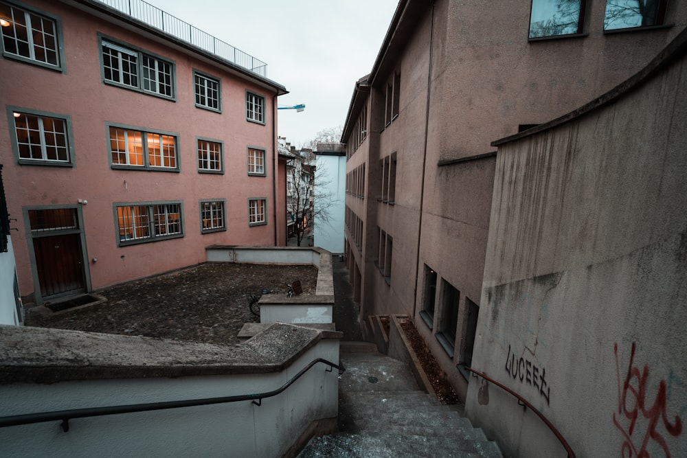 a view of a building from the top of a flight of stairs