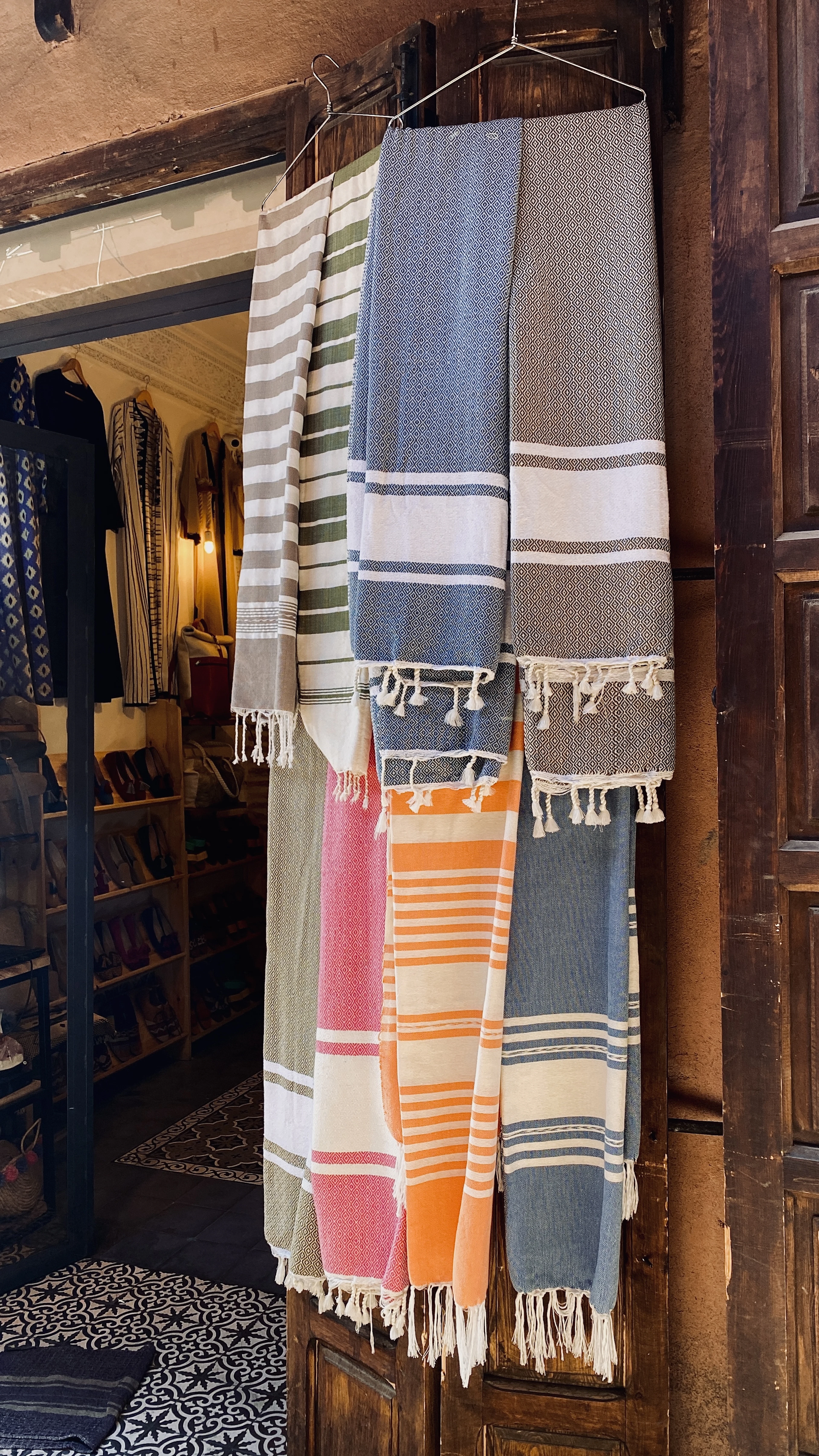 Turkish towels hanging on a rack