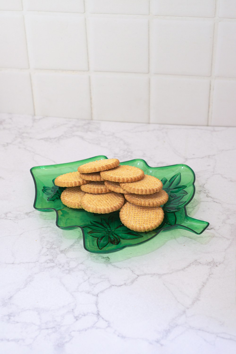 a plate of crackers sitting on top of a counter