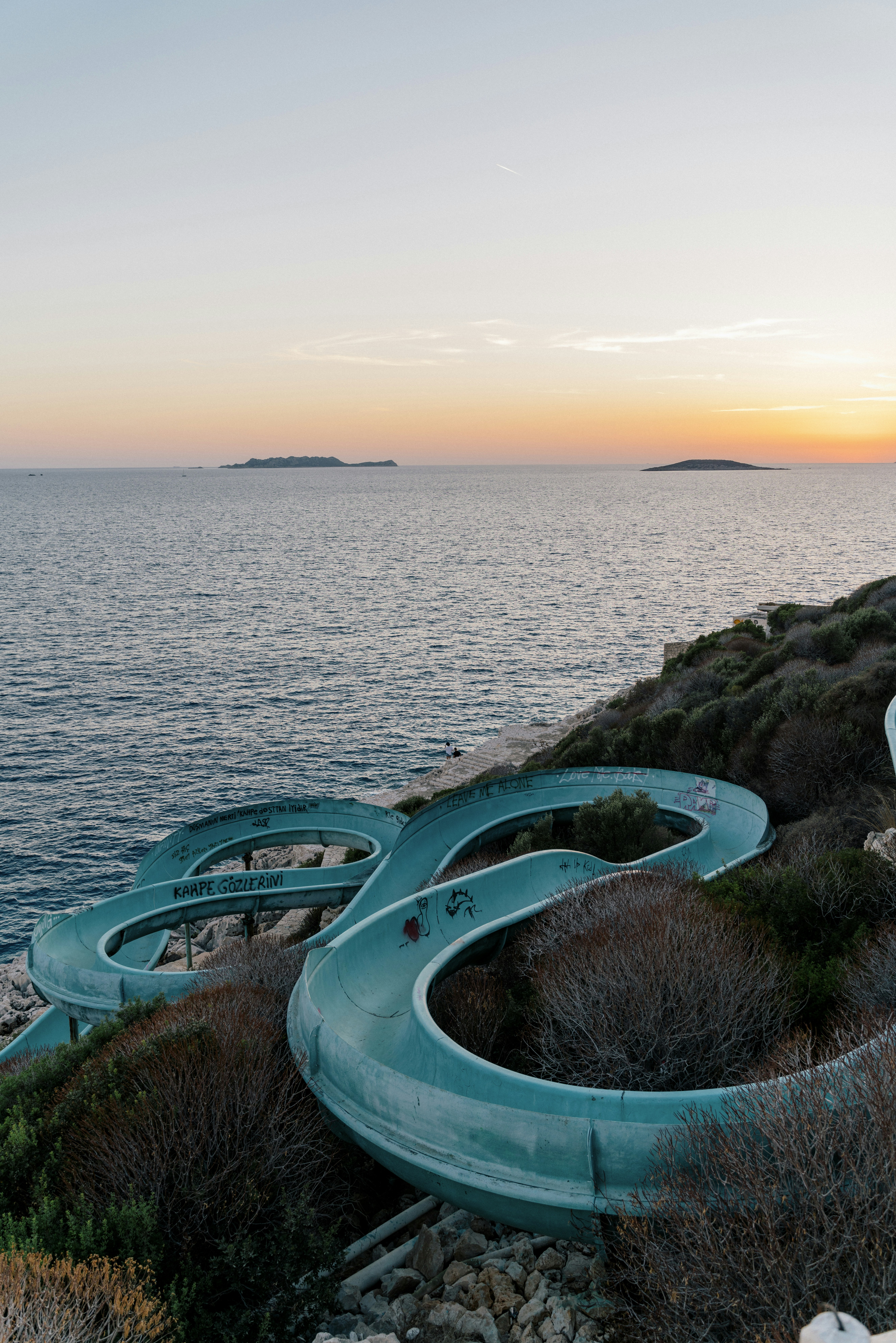 woman wearing yellow long-sleeved dress under white clouds and blue sky during daytime