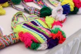 a group of colorful bags sitting on top of a table