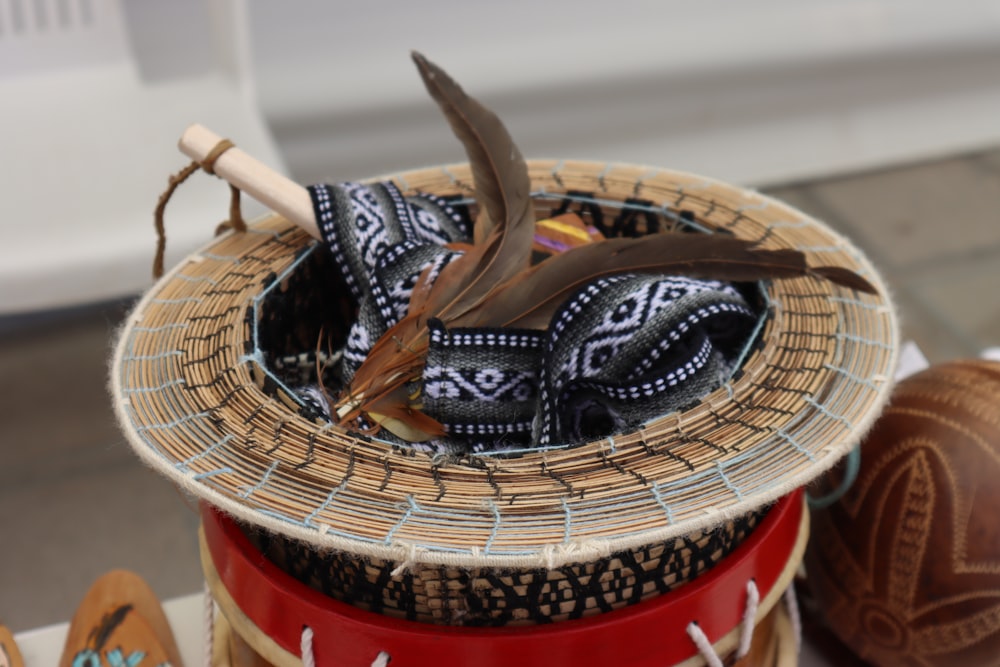 a close up of a basket with a bird on top of it