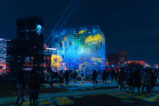 Evening view of the Dakar Rally 2025 site illuminated with event lighting, highlighting Outscene’s rental setups