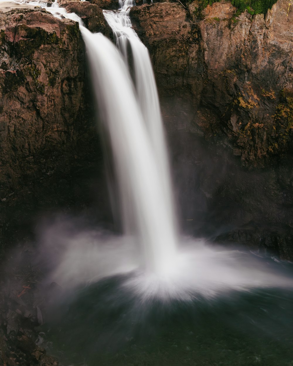 a waterfall with a large amount of water coming out of it