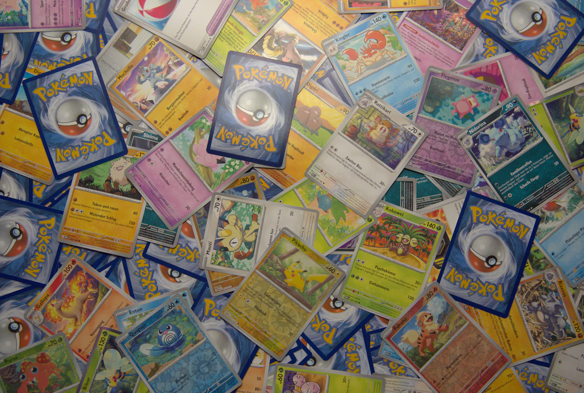 A bunch of Pokemon cards on a table