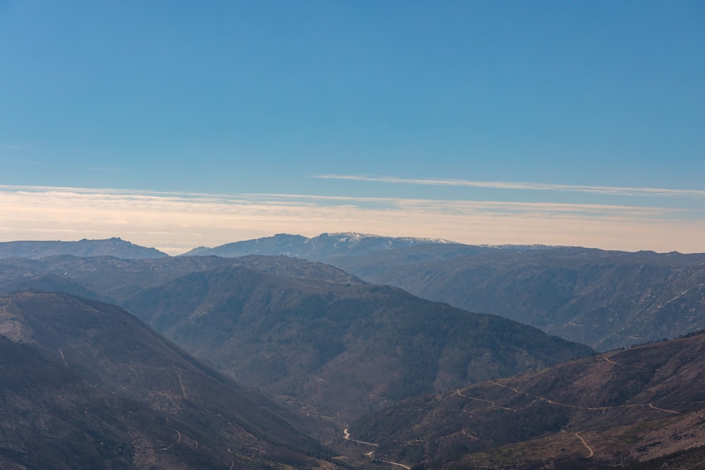 a view of a mountain range from a high viewpoint