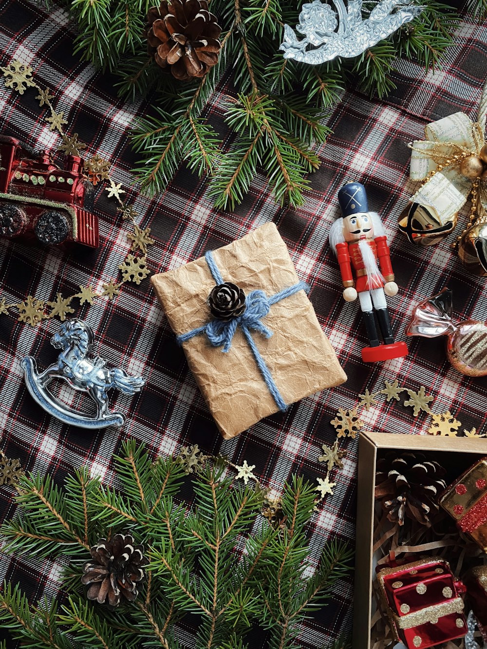 a christmas tree with presents and ornaments on it