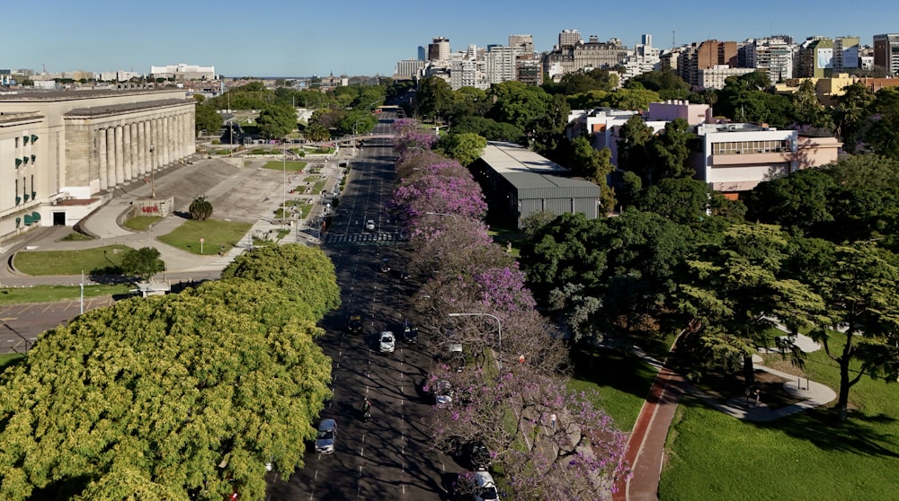 an aerial view of a city with tall buildings