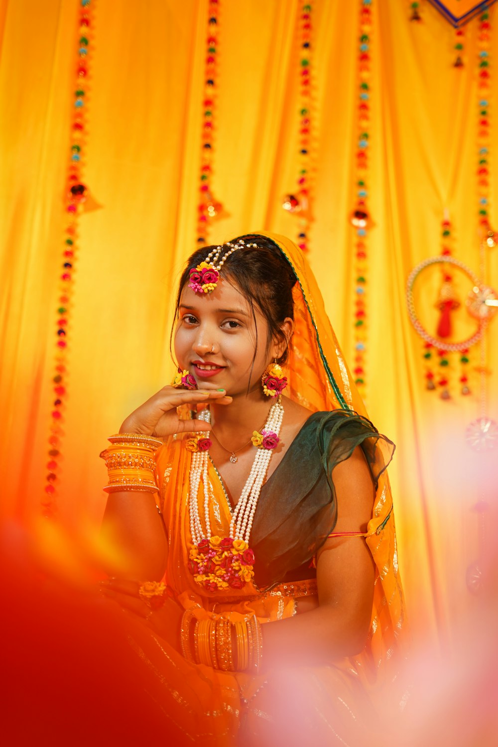 a woman in a yellow and green outfit