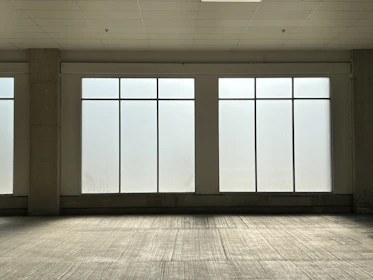 A freshly cleaned commercial space with shining floors and spotless windows.