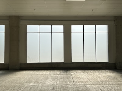 Wide view of a spotless slate floor in a commercial space after heavy cleaning.