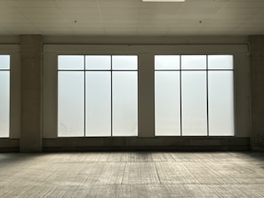 A commercial space floor polished and free of dust after post construction cleaning.