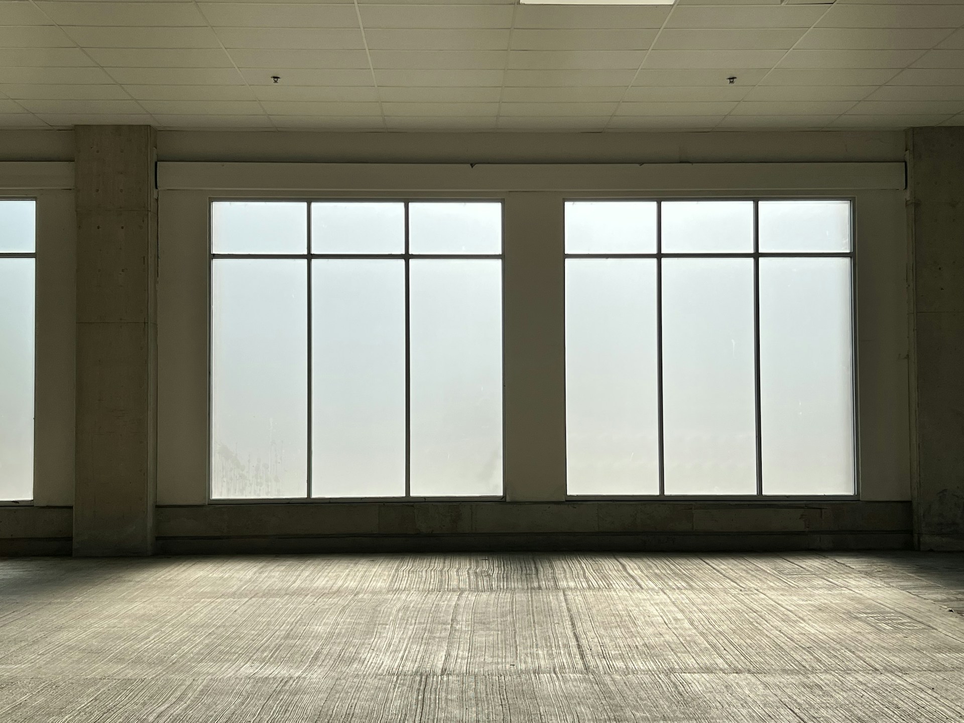 woman wearing yellow long-sleeved dress under white clouds and blue sky during daytime