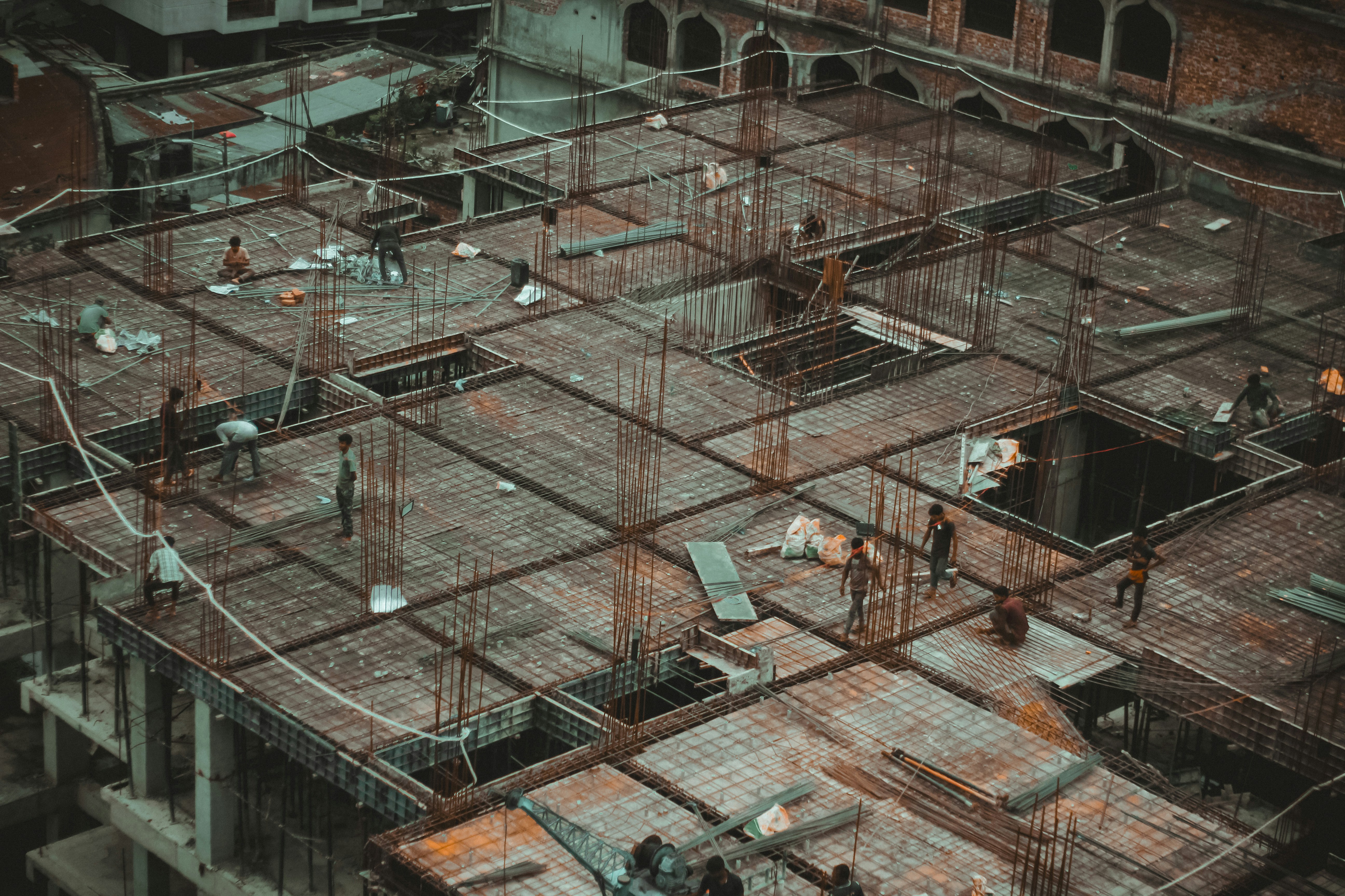 Construction site showing skilled workers implementing quality building processes